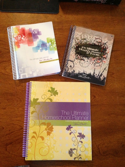 The Ultimate Planner System with the Student and Teen's planner on top and the Parent's Ultimate Planner on the bottom.